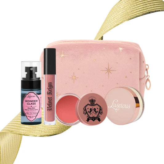 Luscious Cosmetics Deluxe Makeup Kit Nude featuring a makeup pouch, lip products, and essential cosmetics on a white background.